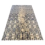 An Elizabeth Ashard 'Moghul', a silk and wool blue tones pattern carpet, 665 x 440cm