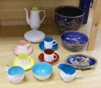 A Carlton ware powder blue jardiniere, similar bowl and oval dish with Oriental design together with