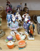 A group of Continental porcelain military figures, two porcelain figures of dancing females and four