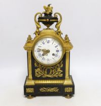 A Louis XVI style bronze and ormolu mantel clock, the enamel dial inscribed Gibson, Paris, 37cm