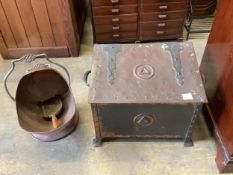 An Arts & Crafts style copper log bin, width 60cm, height 41cm together with a copper helmet