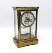 A late 19th century French brass and champleve enamel four glass mantel clock, 29cm