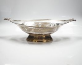 An Edwardian pierced silver two handled oval pedestal dish, with engraved inscriptions, Thomas