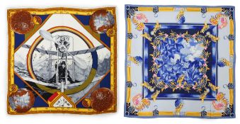 A Must de Cartier vintage silk scarf with owls in sapphire and a Must de Cartier silk scarf with