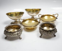 A pair of George V silver gilt shallow pedestal salts, with twin serpent handles, William Hutton &