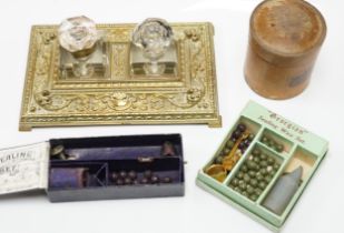 A brass inkwell, a treen box and a sealing wax set