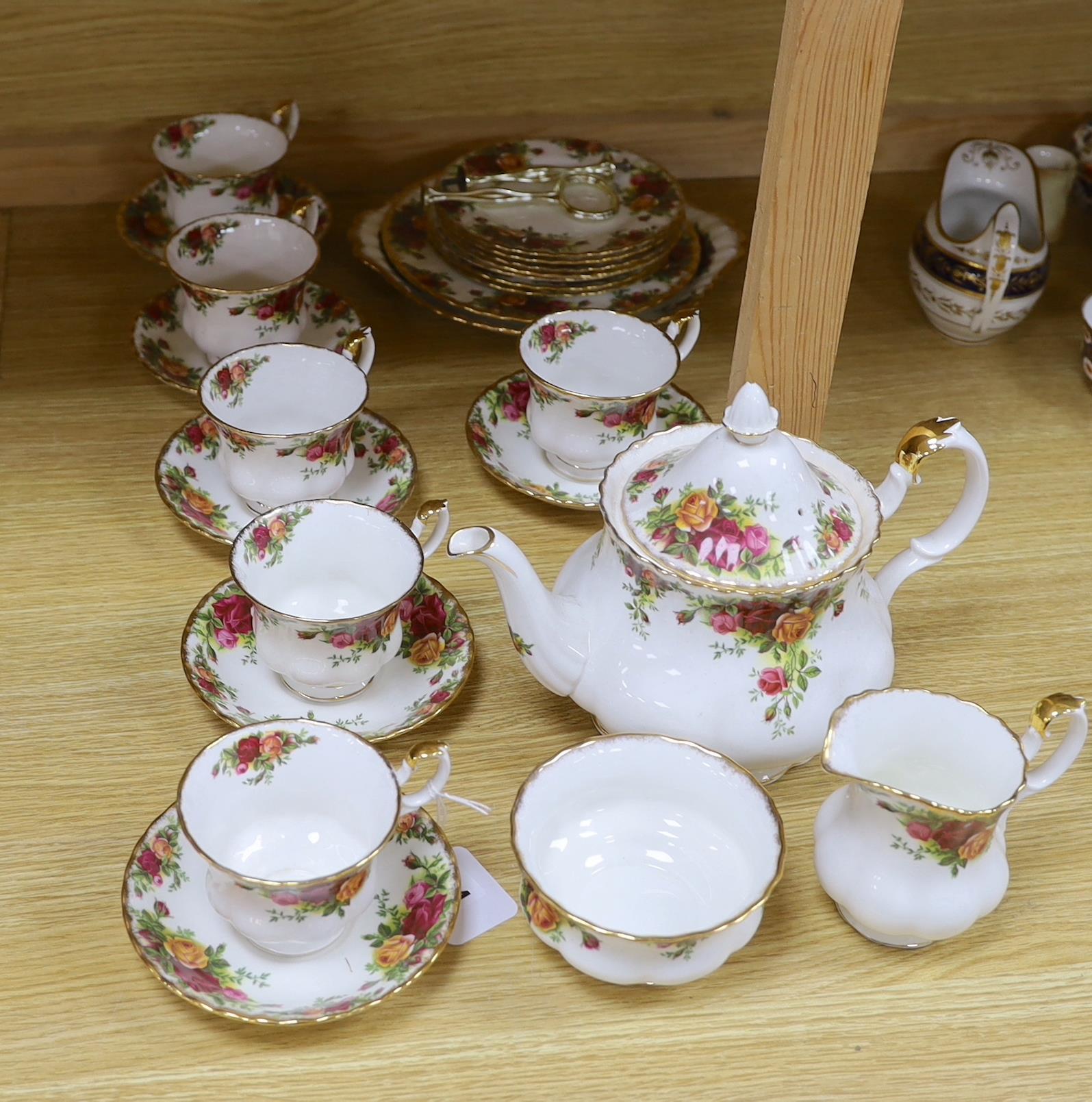 Royal Albert Old Country Roses part tea set including six trios, teapot milk jug and sugar bowl,