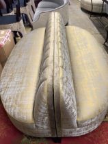 A bespoke Bray Design oval shape conversation sofa, upholstered in Rubelli Venezia Venier Piombo