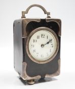 A George V silver mounted tortoiseshell cased carriage clock, with Arabic dial, chips to the case
