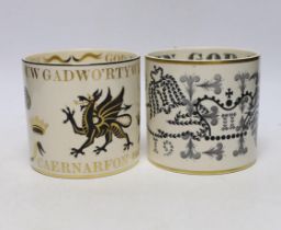 Two Wedgwood commemorative mugs by Guyatt; the Investiture of the Prince of Wales and the Coronation
