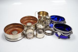 Sundry small silver wares including a pair of modern wine coasters, purse, mug, jug, napkin rings,