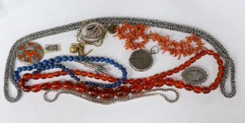 Assorted jewellery including a graduated simulated amber bead necklace, coral branch necklace, white