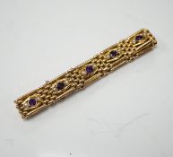 An Edwardian 15ct, amethyst and seed pearl set gate link bracelet, 18cm, gross weight 24.2 grams.