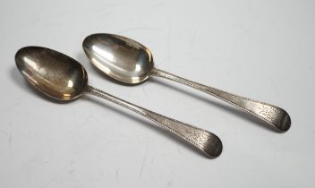 A pair of George III silver feather edge Old English pattern table spoons, by Hester Bateman,