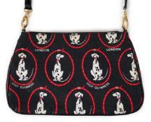 A vintage Lulu Guinness black canvas Dalmatian handbag with black patent leather strap and piping,