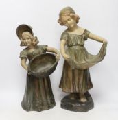 A pair of Austrian cold painted terracotta figurines, largest 45cm high