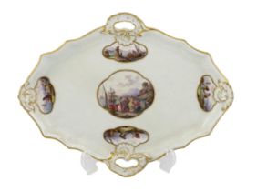 A Meissen porcelain lozenge shaped tray, 19th century, painted with figures in seascapes, ozier