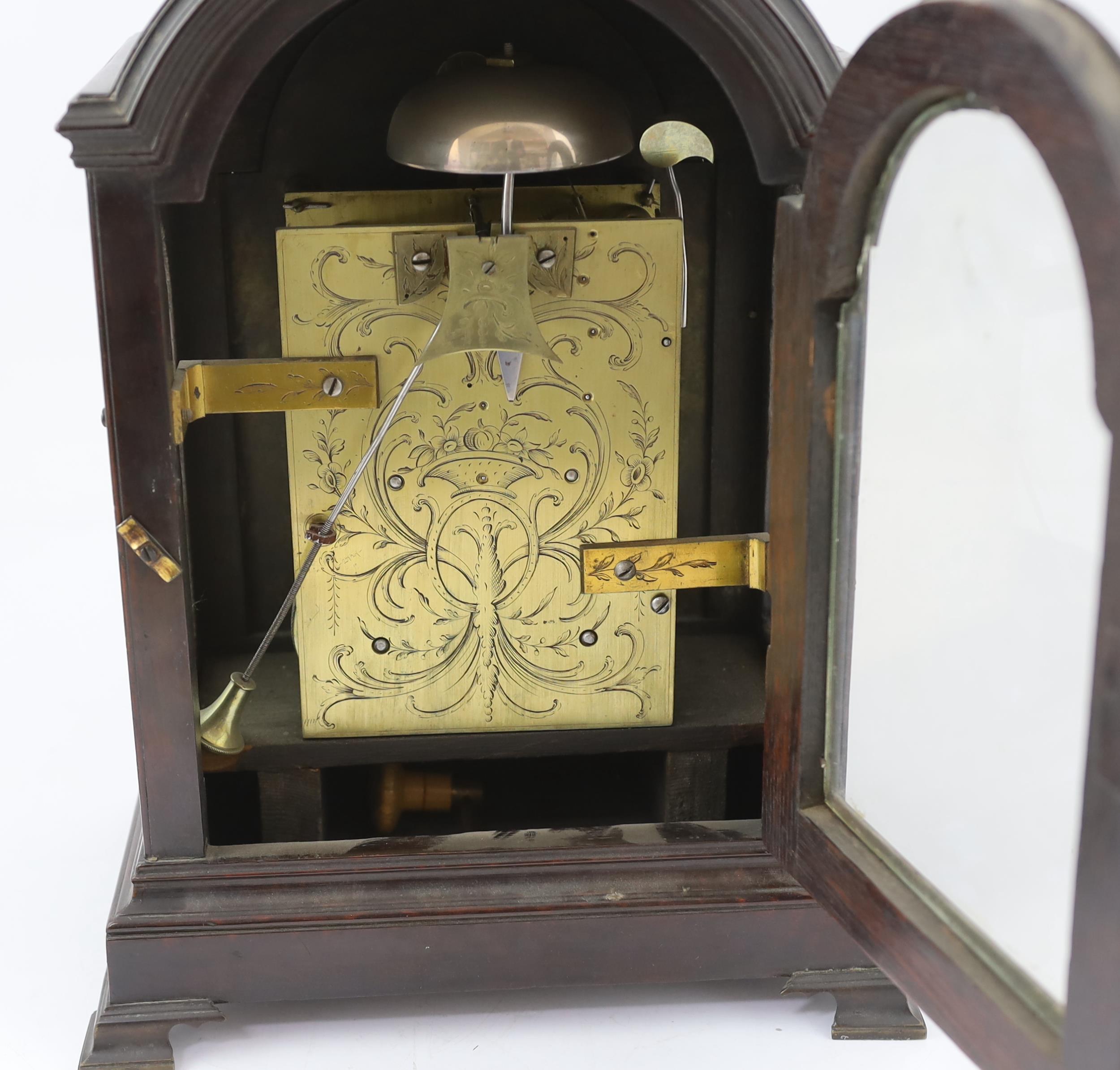 Kentish & Haynes of London, a George III ebonised eight day bracket clock in arched case with - Image 5 of 5