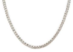 A modern Cartier 18ct white gold and diamond line choker necklace, with Cartier box and