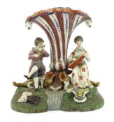 A Staffordshire pearlware musical duet spill vase, c.1820, the figure of a gentleman playing the