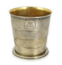 ROYAL INTEREST: A cased Victorian textured silver collapsible travelling cup, by Brownett & Rose,
