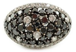 A modern pair of 750 white gold and two colour diamond cluster dress ring, set with black and