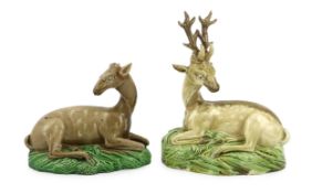 A near pair of Ralph Wood type figures of a Stag and Hind, c.1790, each modelled recumbent upon a