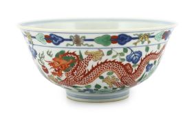A Chinese wucai ‘dragon and phoenix’ bowl, Qianlong mark and possibly of the period, the exterior
