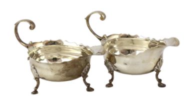 A pair of late George II silver small sauce boats, by Robert Albin Cox, with cut rims and flying