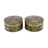 A pair of Chinese purple ground cloisonné enamel circular boxes and covers, 19th century, each