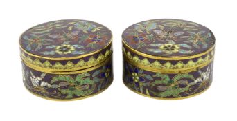A pair of Chinese purple ground cloisonné enamel circular boxes and covers, 19th century, each