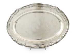 A George III silver oval meat dish, by William Fountain, with gadrooned border and engraved crest,