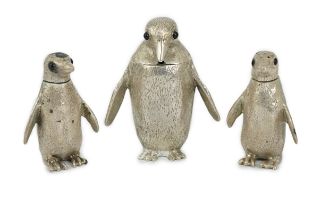 An Elizabeth II graduated suite of three novelty silver condiments, modelled as penguins, by William