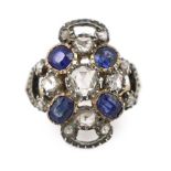An antique gold and silver, sapphire and rose cut diamond cluster set dress ring, size K, gross