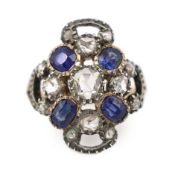 An antique gold and silver, sapphire and rose cut diamond cluster set dress ring, size K, gross