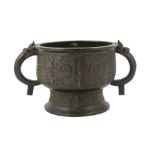 A large Chinese archaistic bronze censer, gui, 17th century, cast in relief with taotie masks and
