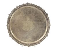 A George III silver salver, by John Mewburn, of shaped circular form with gadrooned border and