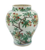A Chinese wucai ‘pomegranate’ baluster vase, Transitional, Shunzhi period, c.1650, painted with
