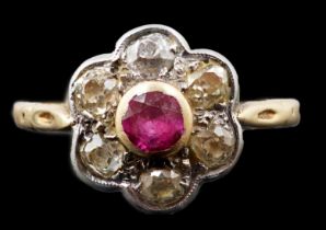 A gold and platinum, ruby and millegrain set diamond flower head cluster ring, size P, gross