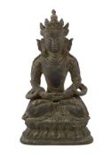 A Chinese bronze seated figure of Amitayus, probably 18th century, 17.5cm high, surface pitted***