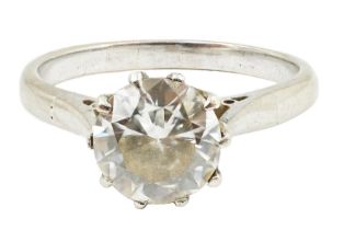 A white gold and solitaire diamond set ring, the stone weighing approximately 1.30ct, with an