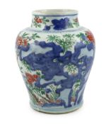 A Chinese wucai ‘rocks and blossom’ vase, Transitional, Shunzhi period, painted with blossoming