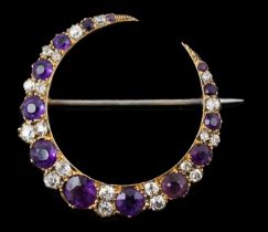A late Victorian gold, graduated amethyst and diamond cluster set crescent brooch, 33mm, with safety