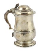 A George III silver tankard by W & J Priest, with hinged domed cover of baluster form, with banded