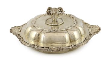 A Victorian ornate silver entree dish and cover with ram's head handle, by John Samuel Hunt (