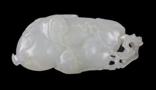 * * A Chinese white jade pendant, carved as a gourd, Qianlong period, with overlapping leaves and
