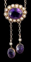 A cased Edwardian 9ct gold, amethyst and seed pearl cluster set double drop pendant necklace,