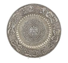 A 20th century Portuguese/Spanish embossed silver charger, with geometric and scroll decoration