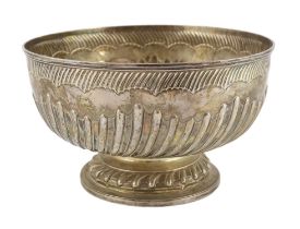 A late Victorian demi fluted silver circular punch bowl, by Goldsmiths & Silversmiths Co. Ltd., on