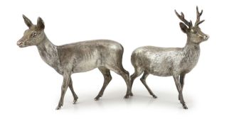 A pair of Elizabeth II Scottish silver free standing models of a stag and doe, by Hamilton & Inches,